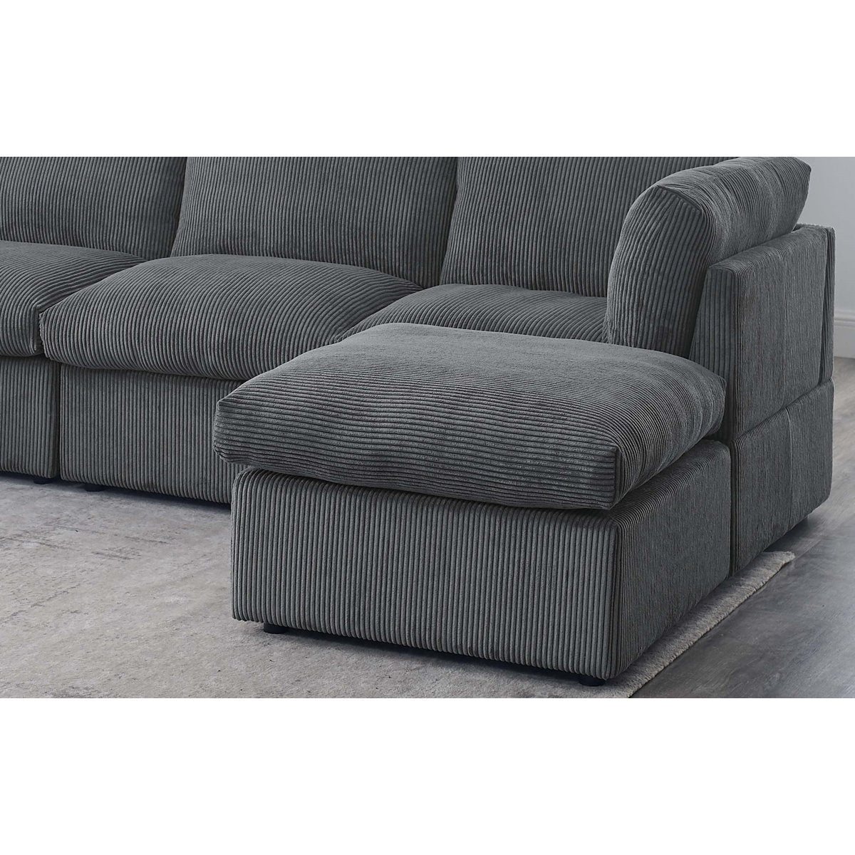 Annai 129" Wide Reversible Modular Corner Sectional with Ottoman